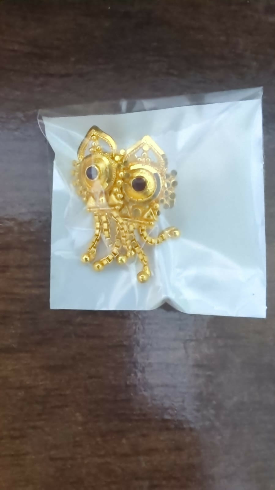 Elegant gold plated jhumka earrings perfect for ethnic occasions and gifting
