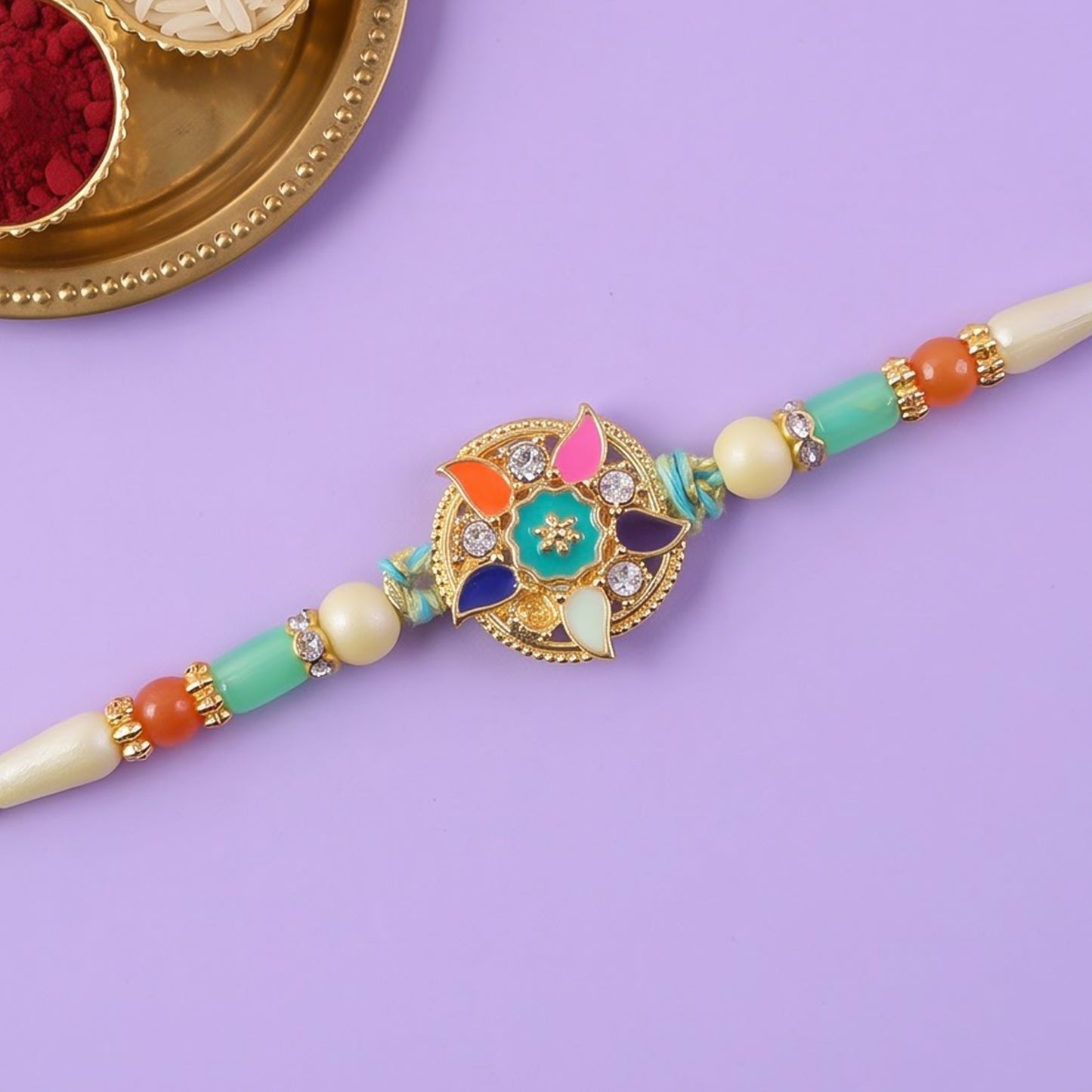 Multicolor Floral Kundan Pendant Rakhi with Pearl and Orange Beads