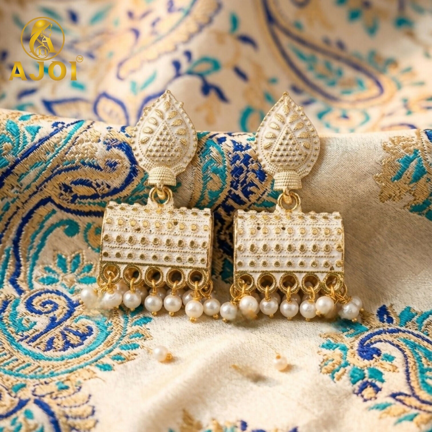 Elegant Gold Plated Pearl Drop Ethnic Earrings with White Design