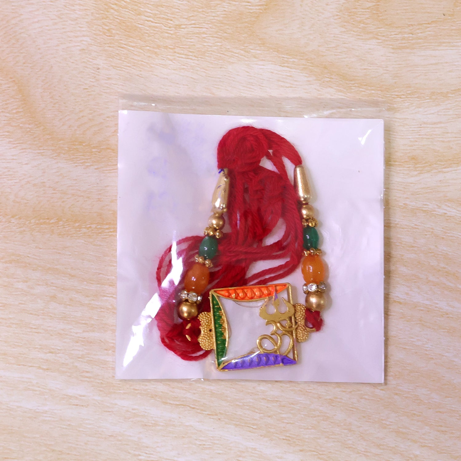 Elegant Rakhi with Square Floral Charm, bead line and chain look for Gift Styling