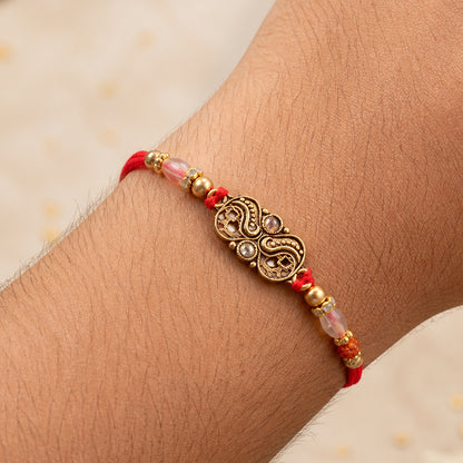 Oxidized Gold Paisley Medallion Rakhi with Rudraksha and Pearl Beads