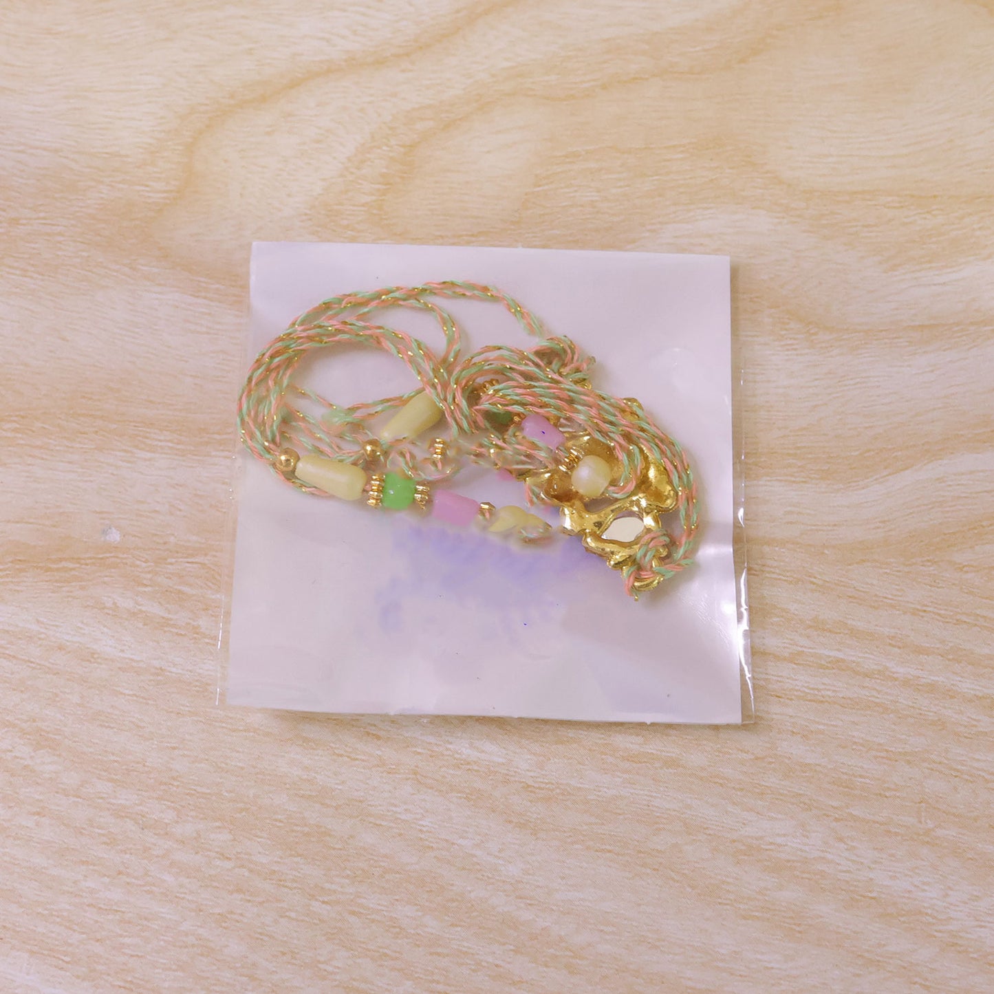 Multicolor Kundan Cluster Pendant Rakhi with Pastel Beads