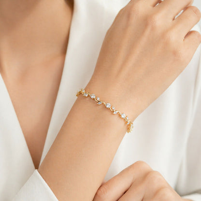 Secure clasp lock on gold-plated tulip bracelet