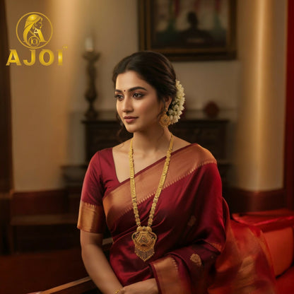 Close-up of ornate pendant on Heritage Glow long necklace set with intricate design