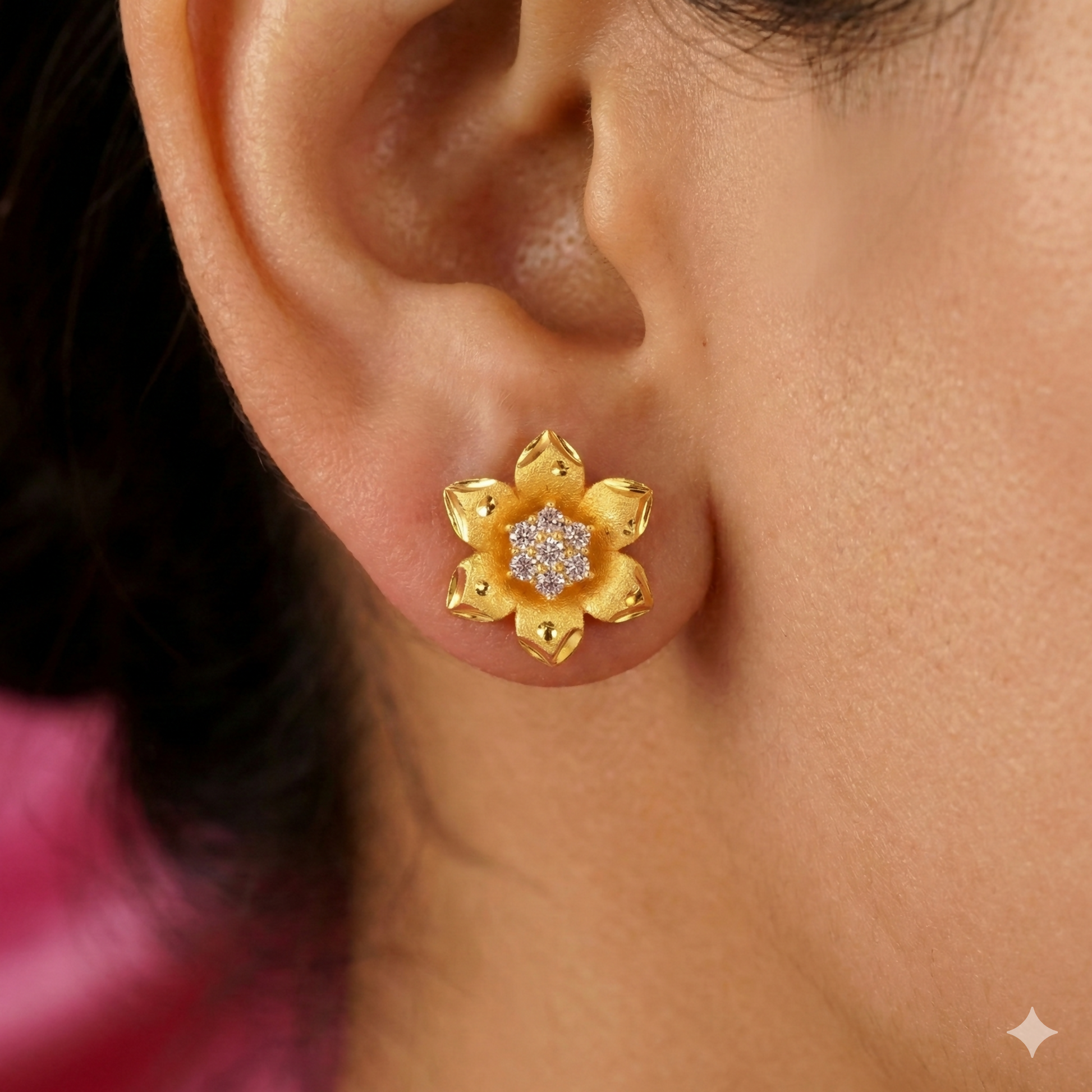Elegant gold plated floral stud earrings side view with brushed matte finish petals