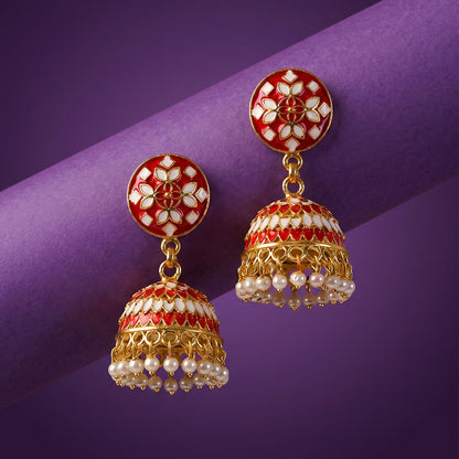 Side view of red floral jhumka earrings with pearl beads