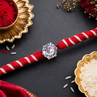 Red-White Twisted Cord Rakhi with Sparkling Round Crystal Pendant