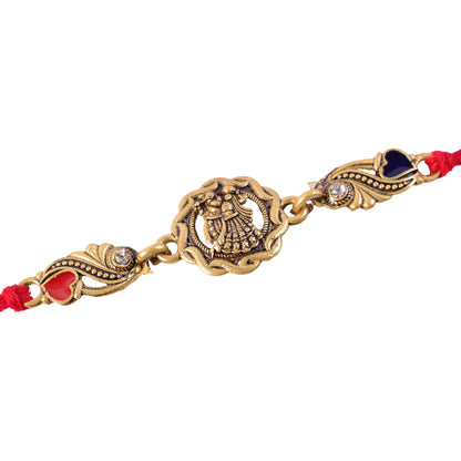 Antique Gold-Toned Radha Krishna Rakhi with Crystal Accents, Enamel Hearts & Red Thread