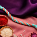 Peach-Turquoise Twisted Cord Rakhi with Beadless Pastel Design