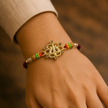 Tilak Trishul Style Devotional Rakhi with Golden Centre and Wooden Beads