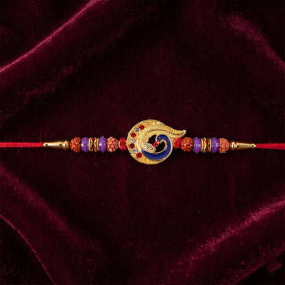 Blue Peacock Rakhi with Purple Beads and Crescent Gold Frame