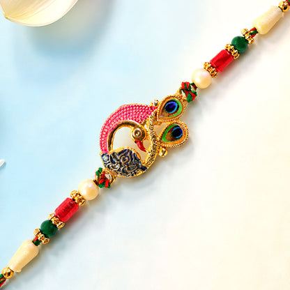 Peacock Rakhi Set with Red Thread, Gold Beads and Meenakari Accent Design