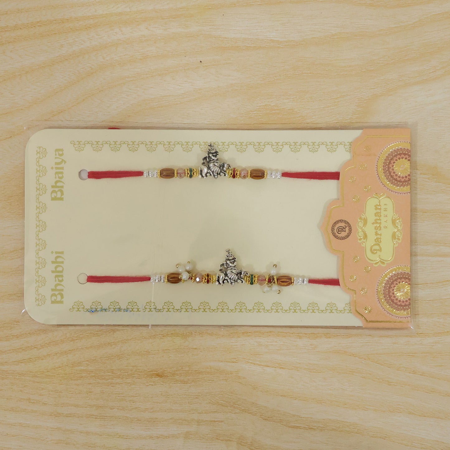 Silver Ganesha Couple Rakhi Set with Amber Crystal Beads and Pearl Lumba Charm Gift