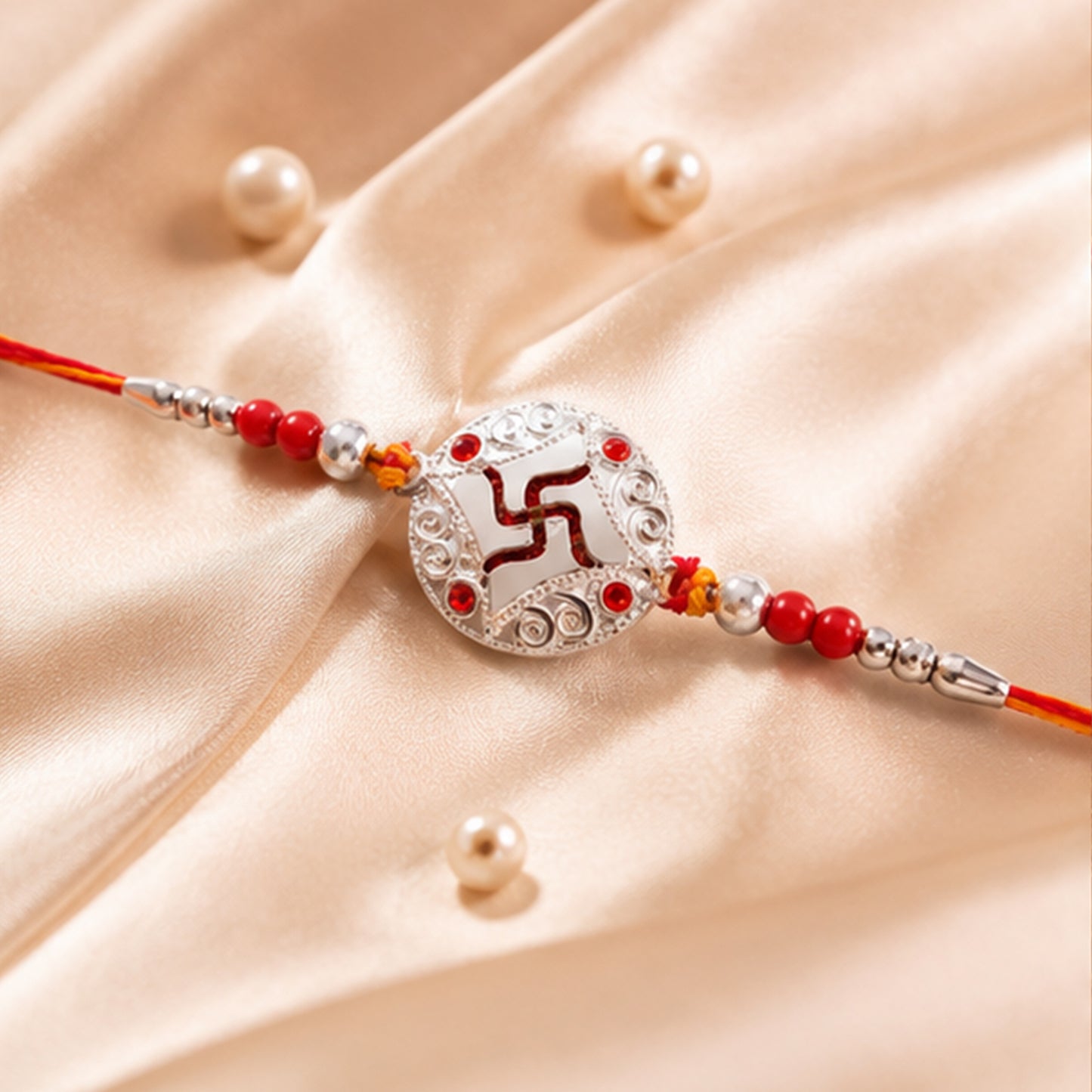 Silver Swastik Stone Rakhi with Red Thread and Handmade Look