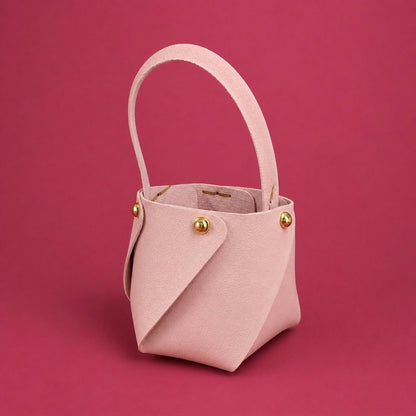 Pink mini bucket handbag open showing interior space