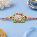 Festive Rakhi featuring Elephant Charm and gold trims in display look for Gift Use