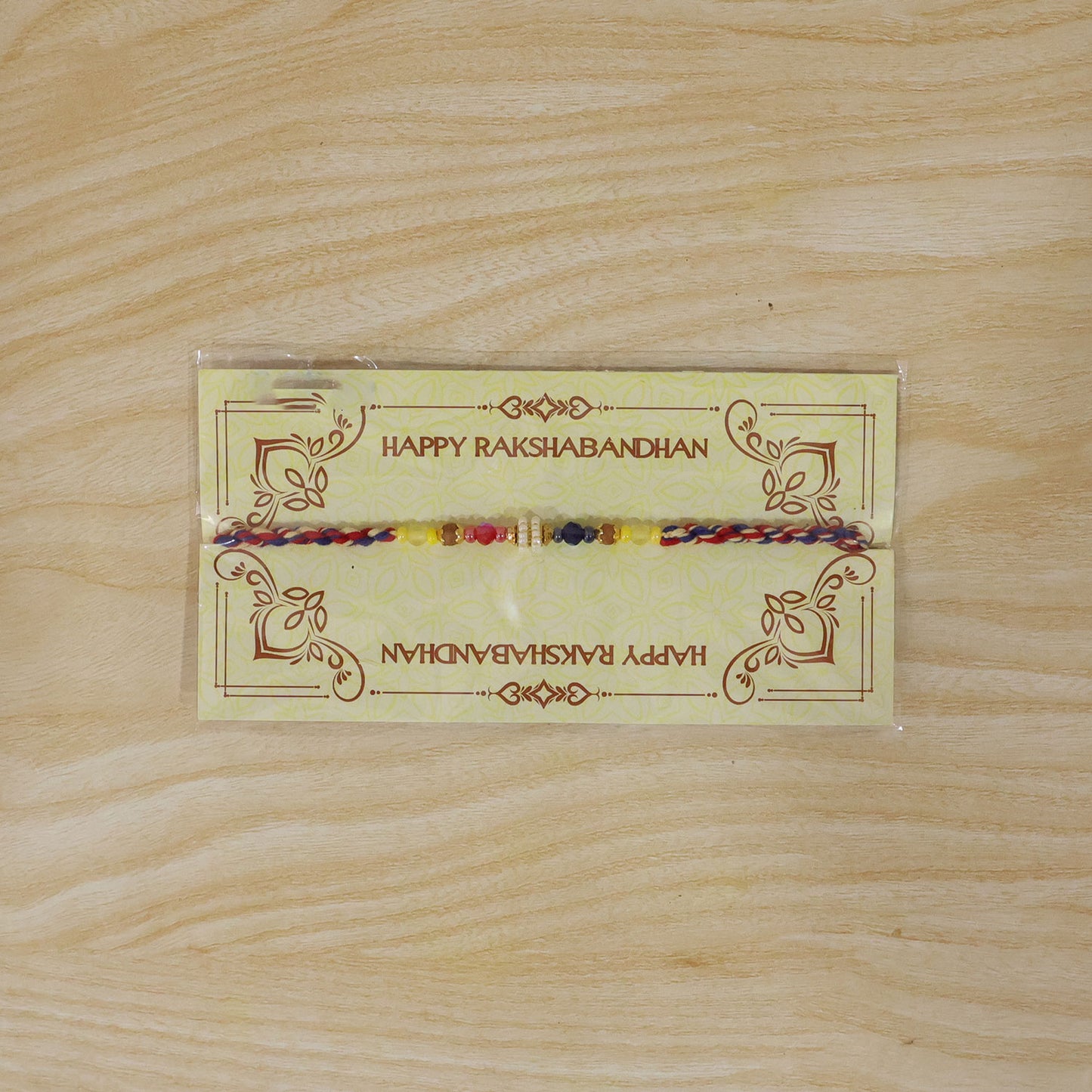 Rainbow Beaded Charm Rakhi with Colorful Festive Style and Playful Bracelet Look