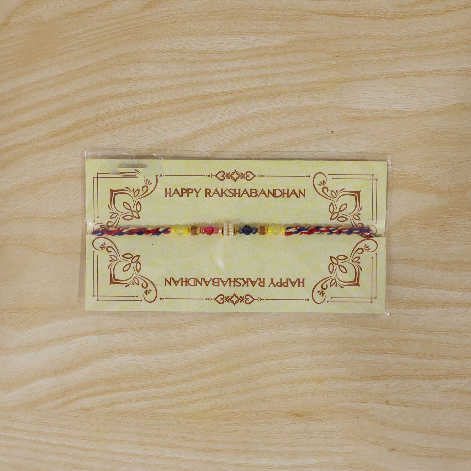 Rainbow Beaded Charm Rakhi with Colorful Festive Style and Playful Bracelet Look