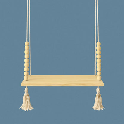 Empty light wood hanging shelf with cream beads and tassels against a solid blue background.
