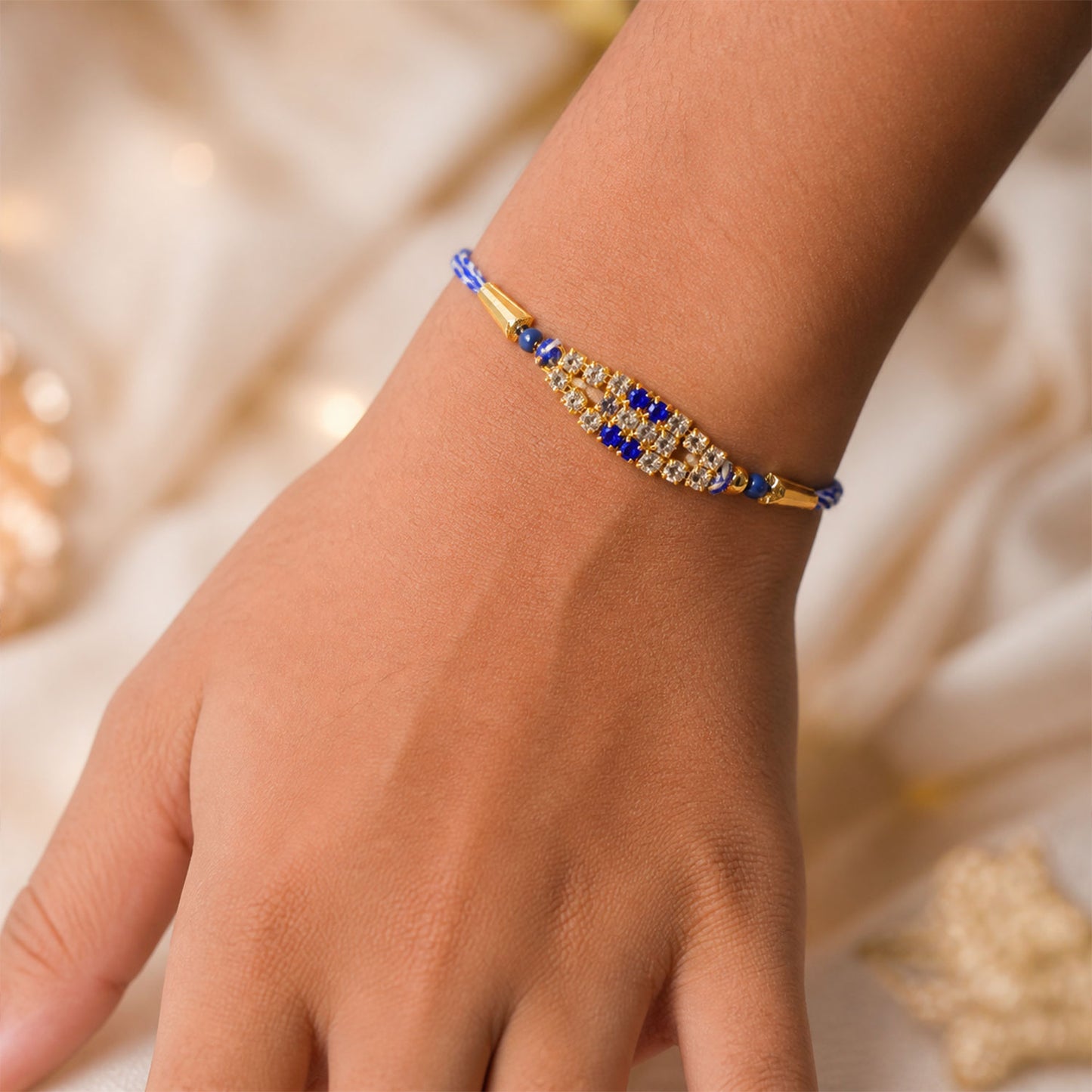 Long Oval Centre Motif Rakhi in Mix Colour Threads (Pack of 6)