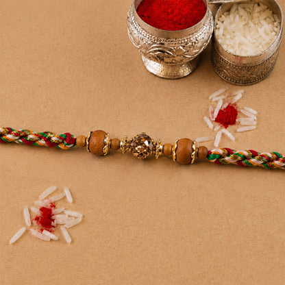 Vibrant Stone Rakhi with Color Beads, Gold Accents and Festive Thread Beauty