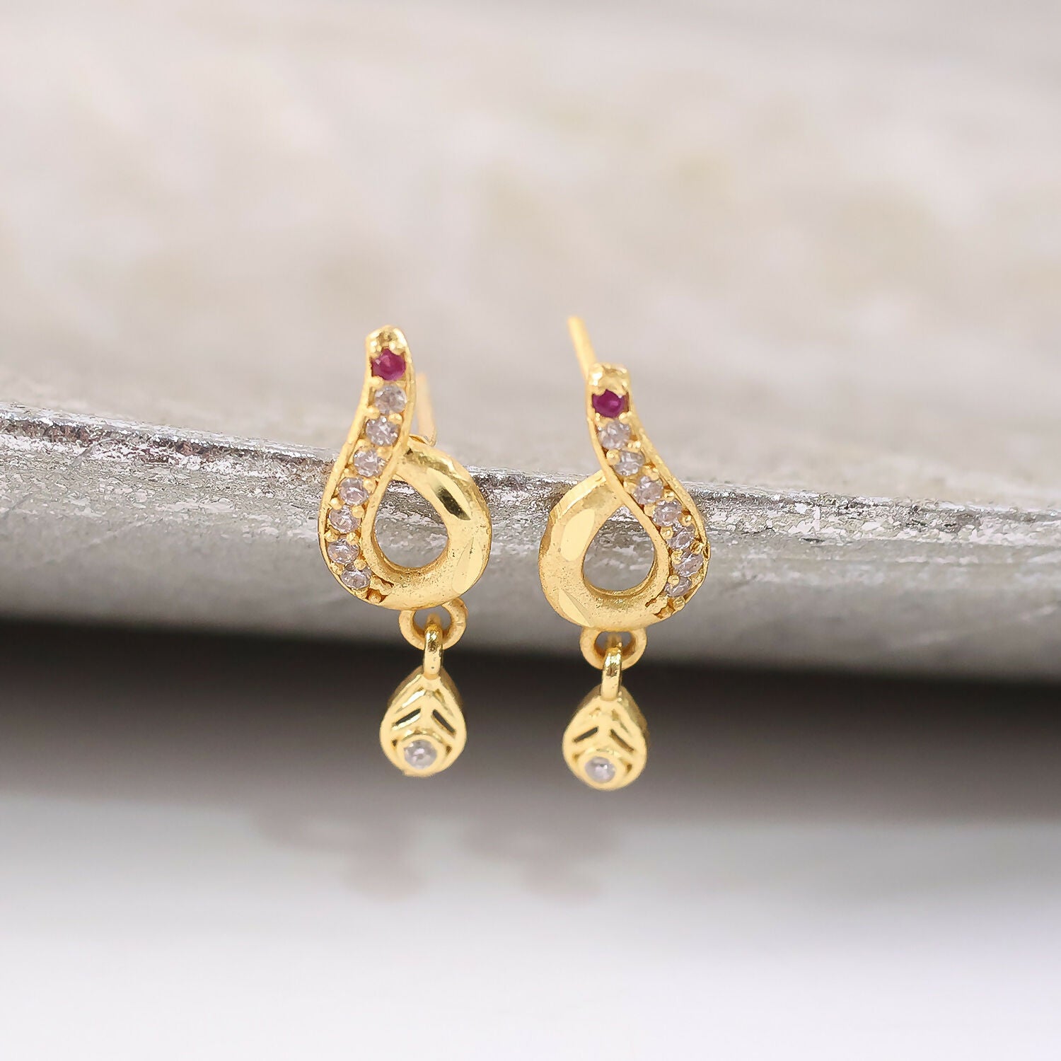 Minimal Curved Leaf Gold Earrings With Crystal Line Work And Small Drop Detailing
