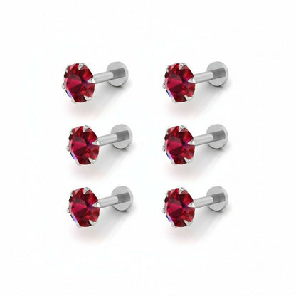 Side view of a silver-plated red crystal nosepin stud showing the flat-back design