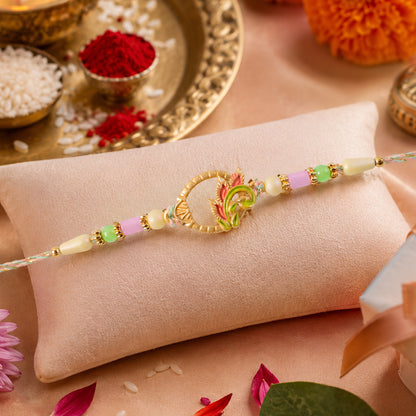 Enamel Peacock Pendant Rakhi with Green and Orange Beads
