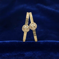 Radiant Golden-Plated Starburst Motif Kadli Bangles Set with Heart Accents and Sparkling CZ Stones (Imitaion Jewellery)