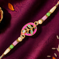 Leaf Shaped Pink and Green Enamel Pendant Rakhi with Pastel Beads