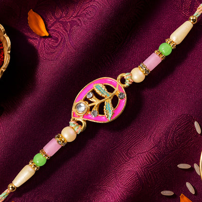 Leaf Shaped Pink and Green Enamel Pendant Rakhi with Pastel Beads