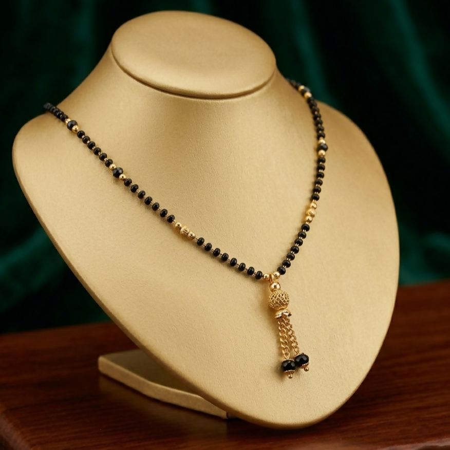 Traditional black beaded mangalsutra on display