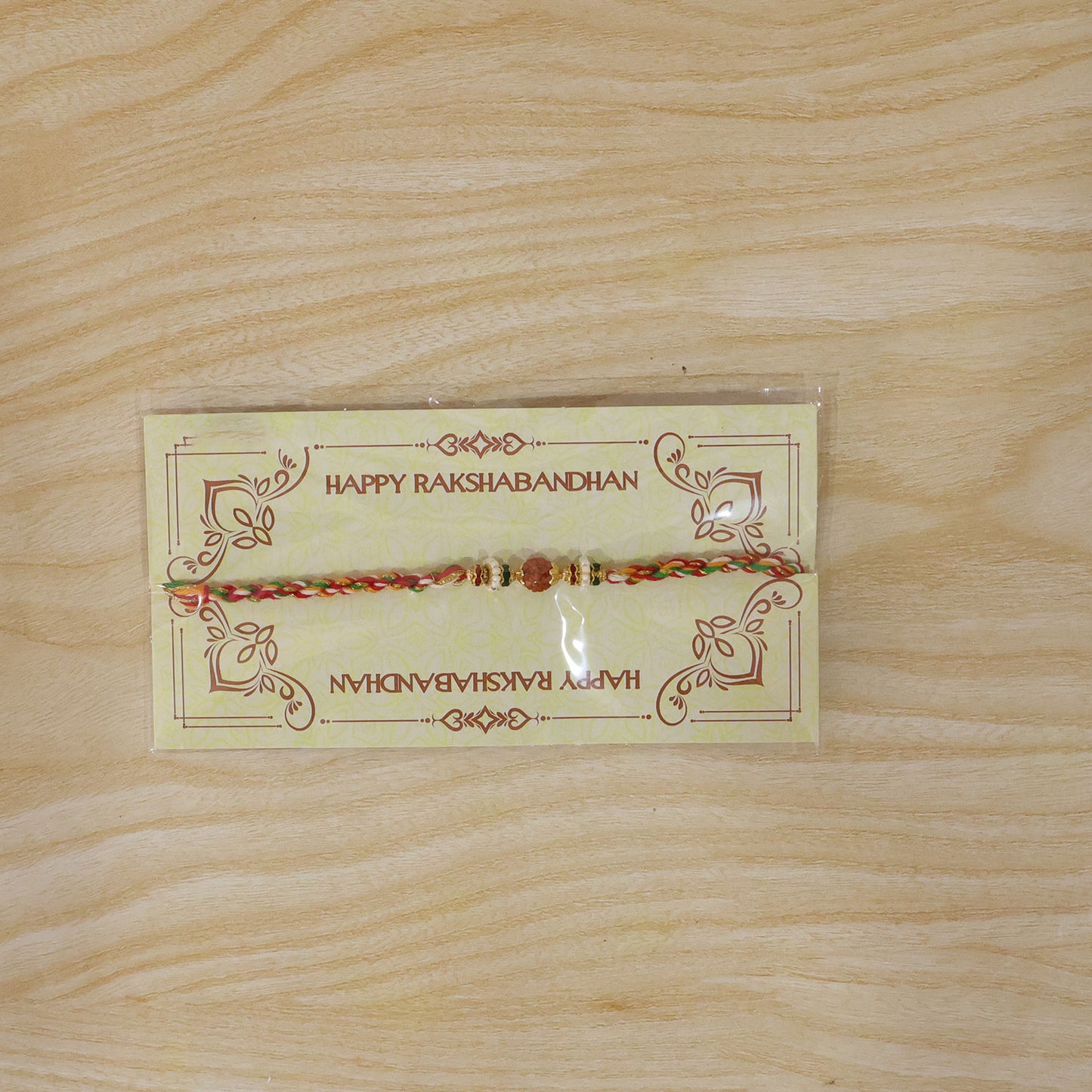 Stone Studded Designer Rakhi with Traditional Beads and Beautiful Festive Finish