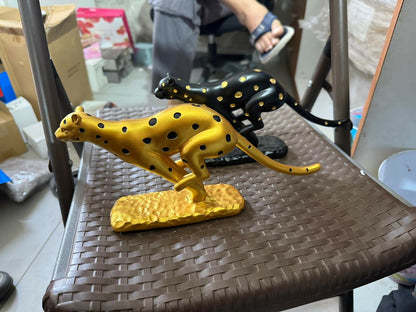 Elegant running leopard showpiece with sturdy base for table decor