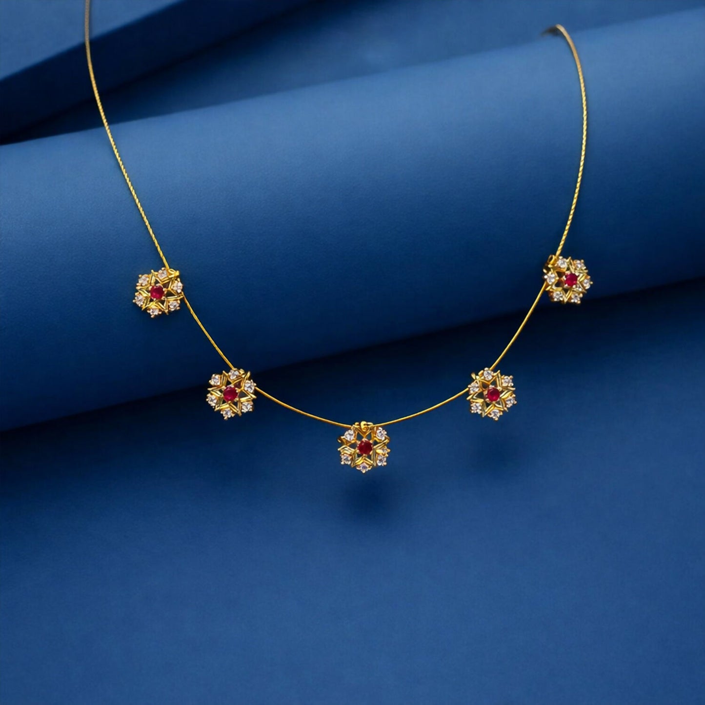 Ruby Blossom Floral Necklace Elegant Golden Petal Design Stylish Chain Jewelry