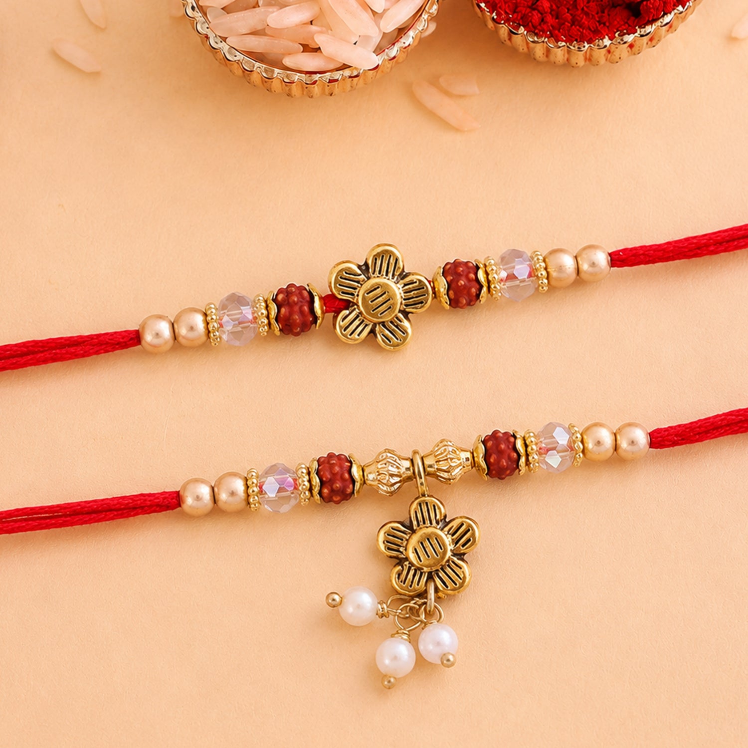 Divine Floral Motif Design Bhai Bhabhi Rakhi with Flower and Pearl Drop for Gifting