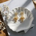Sunburst Floral Jhumka Earrings – Elegant Gold Finish Studs