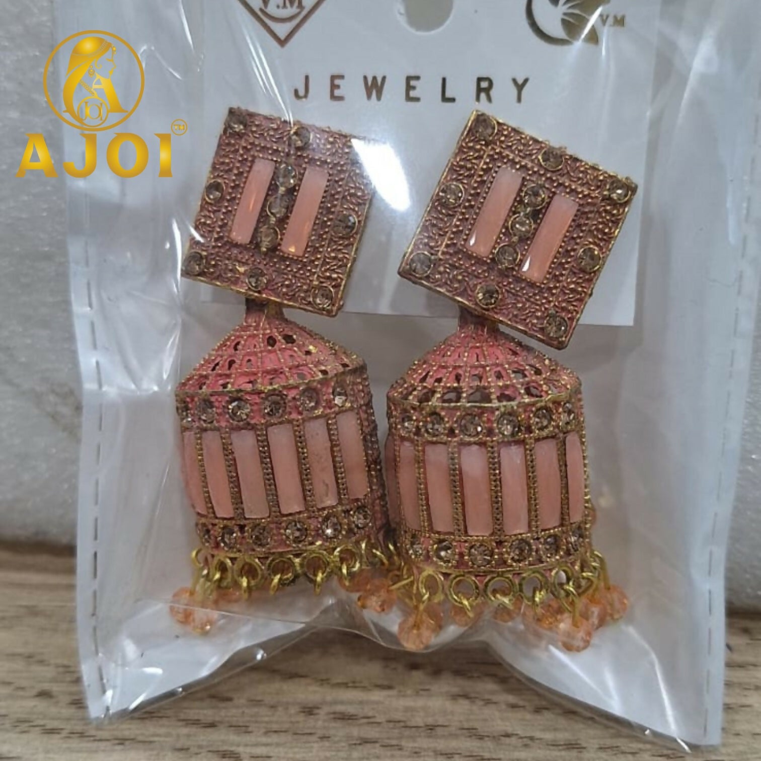 Blush Pink Designer Earrings with Elegant Stone Detailing and Drop Finish