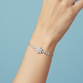 AD Bracelet – Elegant Floral Motif with Sparkling Stones