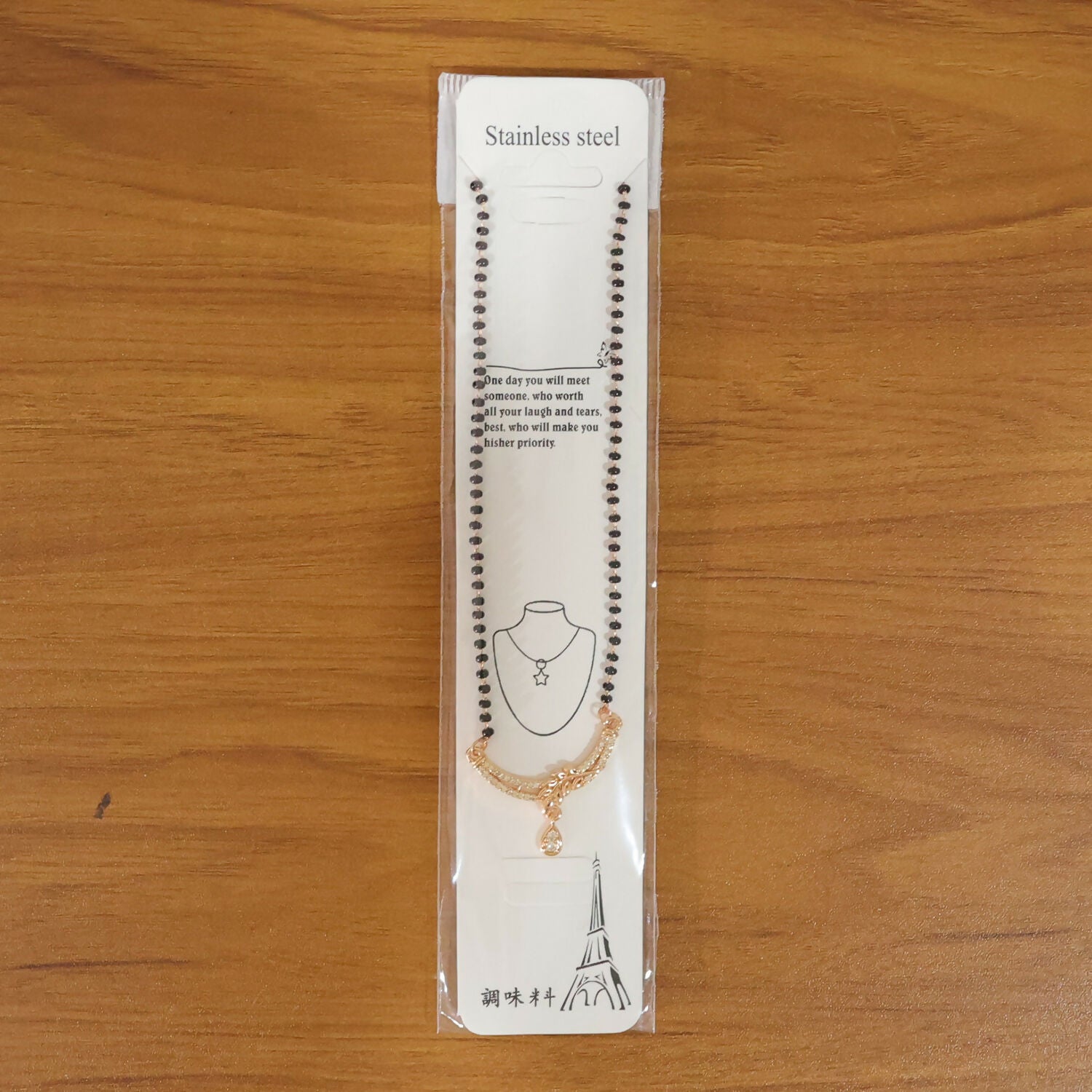 Close-up image of the detailed craftsmanship on mangalsutra pendant