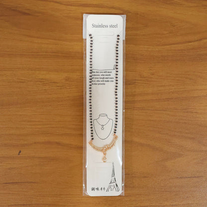 Close-up image of the detailed craftsmanship on mangalsutra pendant