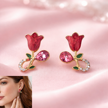 Close-up of a single gold plated rose floral crystal stud earring