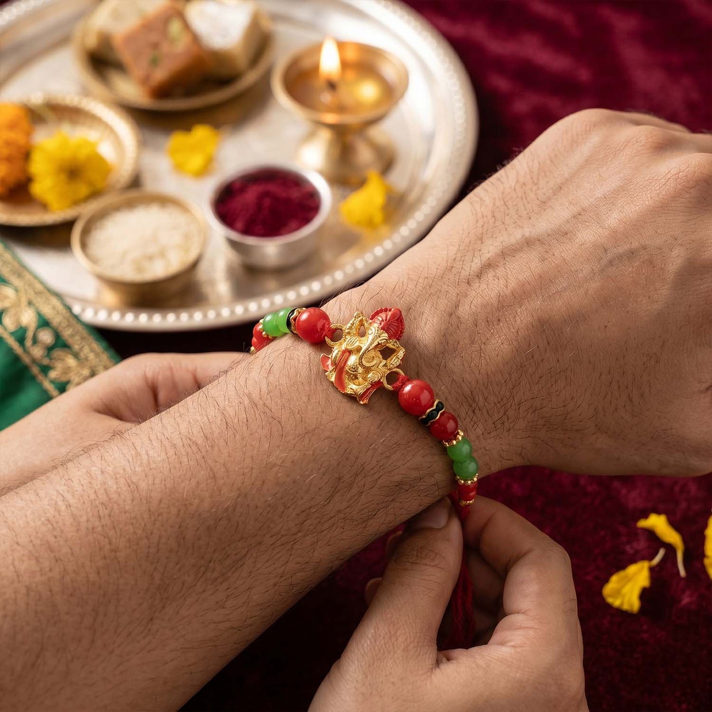 Close-up of decorative beads on Ganesha Rakhi