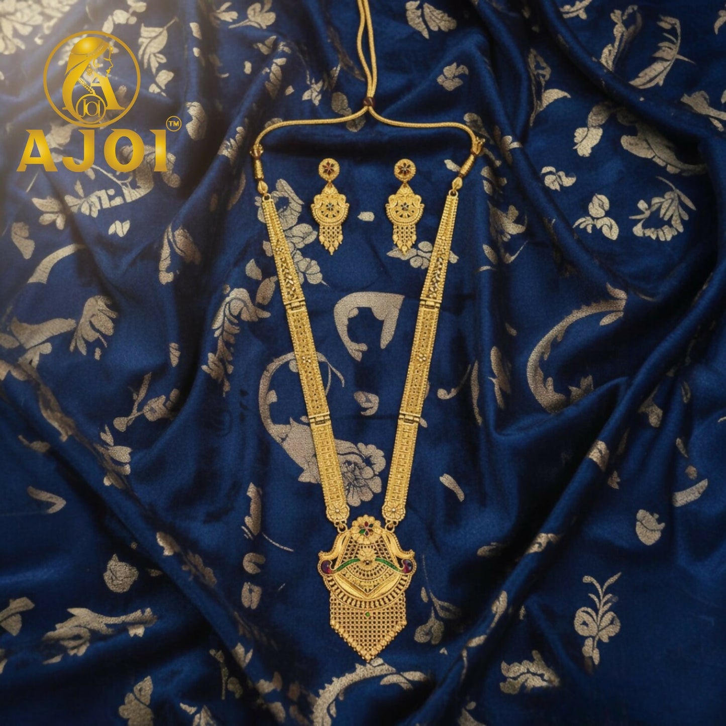 Elegant gold filigree necklace set styled with traditional Indian attire