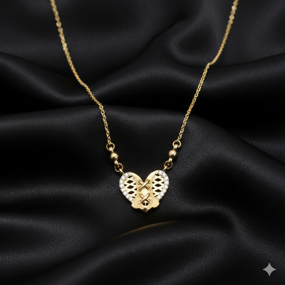 Gold heart pendant necklace with diamond accents close-up view