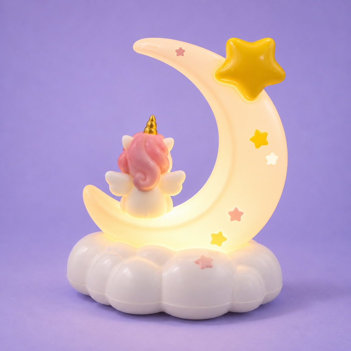 The unicorn crescent moon night light, illuminated, is set against a solid purple background.