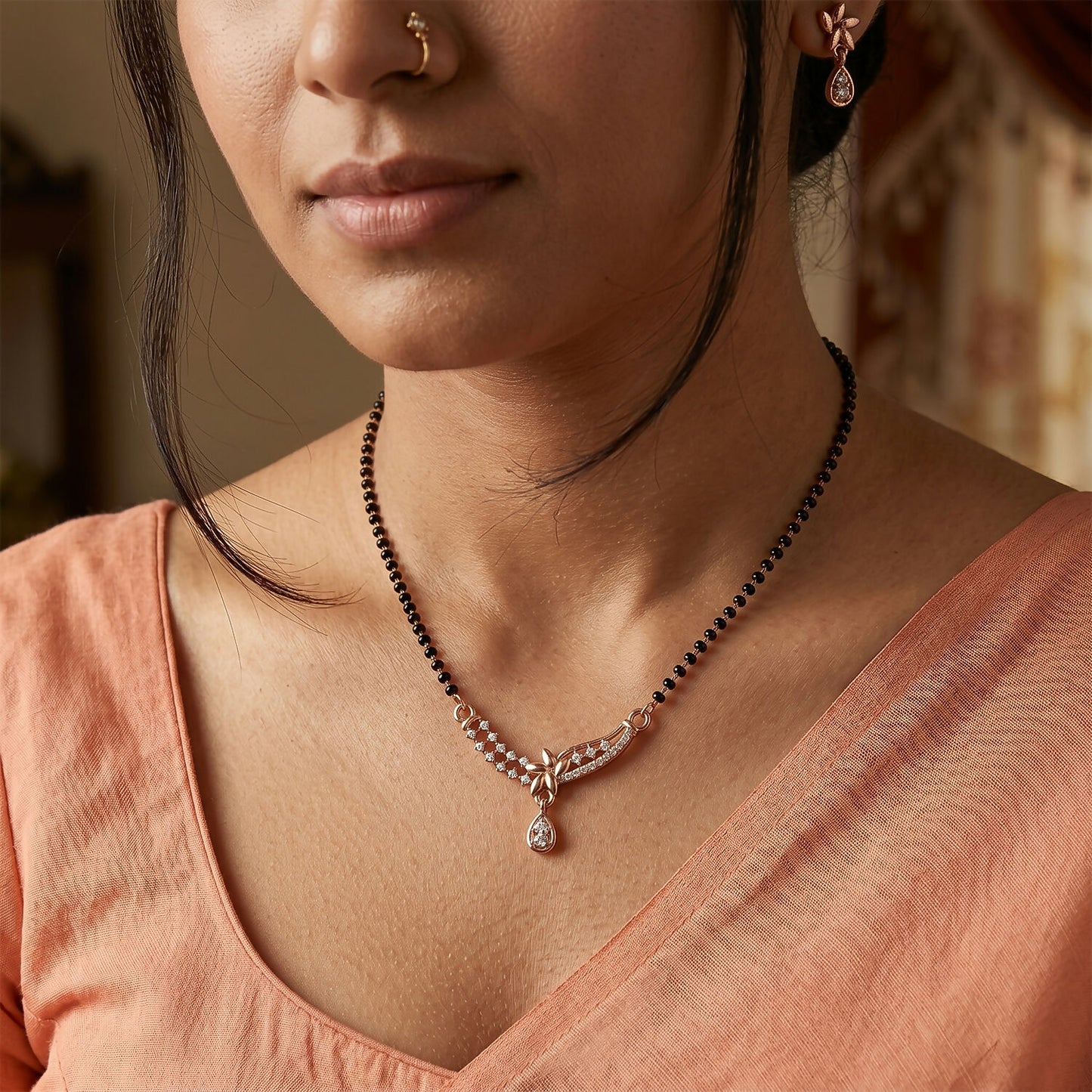 Close-up of the stylish drop pendant with embedded stones