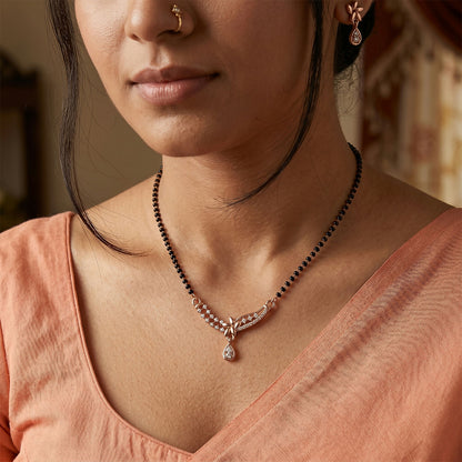 Close-up of the stylish drop pendant with embedded stones