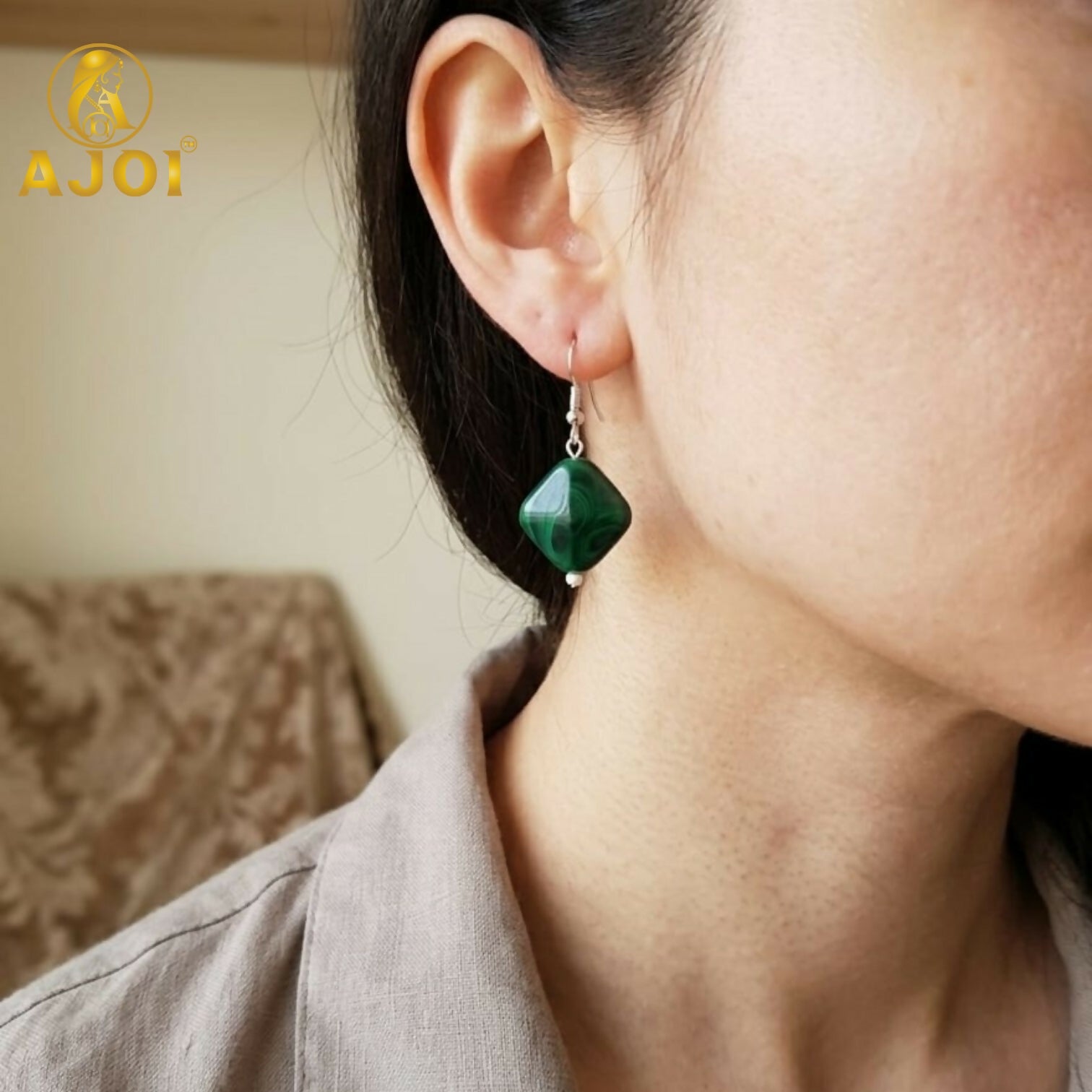 Close-up of vibrant colorful stone drop earrings