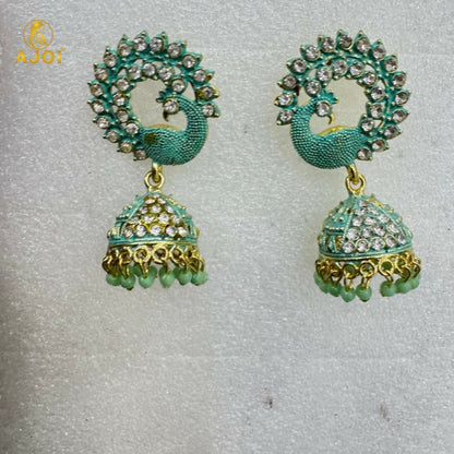Festive look featuring mint green peacock jhumka earrings